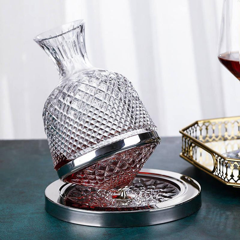 Elegant Pina Shaped Revolving Decanter With Stand